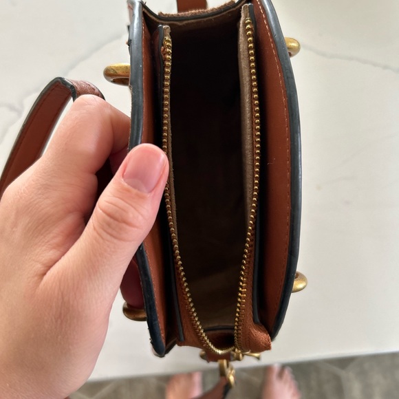 Tan, round, cross body purse - Picture 4 of 5